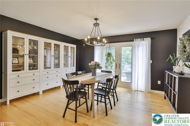 1925 Peach Tree Ln, Lower Saucon Twp, PA 18015 - dining space with a chandelier, light wood-style floors, and french doors