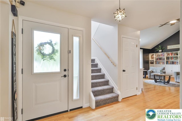 1925 Peach Tree Ln, Lower Saucon Twp, PA 18015 - entrance foyer with stairs, light wood-type flooring, and lofted ceiling
