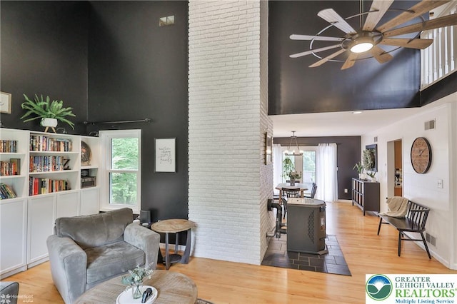 1925 Peach Tree Ln, Lower Saucon Twp, PA 18015 - living room with a high ceiling, a ceiling fan, wood finished floors, and healthy amount of natural light