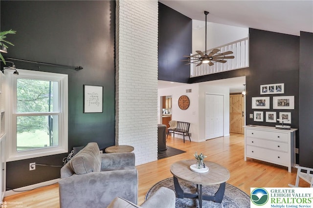 1925 Peach Tree Ln, Lower Saucon Twp, PA 18015 - living area featuring high vaulted ceiling, light wood-type flooring, and a ceiling fan