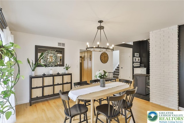 1925 Peach Tree Ln, Lower Saucon Twp, PA 18015 - dining room with a chandelier, stairs, and light wood-type flooring
