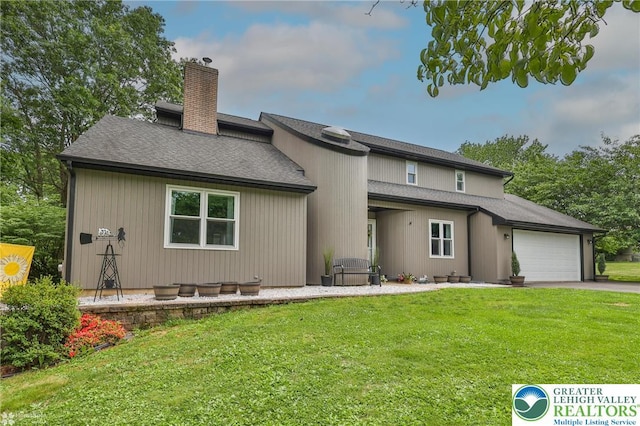 1925 Peach Tree Ln, Lower Saucon Twp, PA 18015 - rear view of property featuring a chimney, an attached garage, a lawn, and driveway
