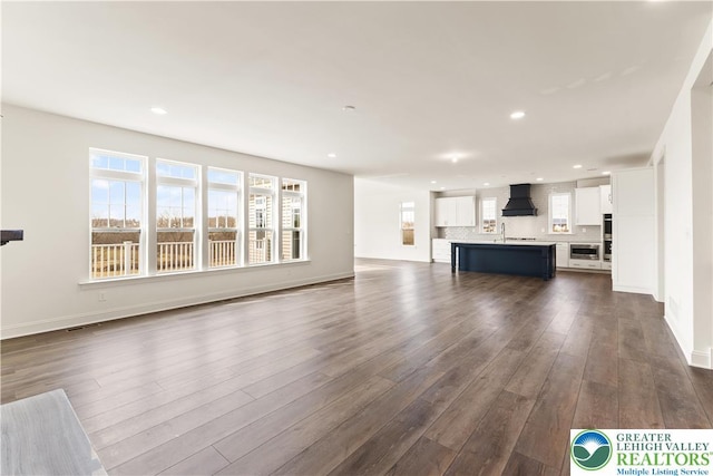 1901 Meadows Rd, Lower Saucon Twp, PA 18015 - unfurnished living room with dark wood finished floors and recessed lighting
