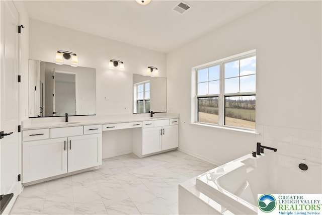 1901 Meadows Rd, Lower Saucon Twp, PA 18015 - full bathroom featuring marble look tiles, double vanity, and a relaxing tiled tub
