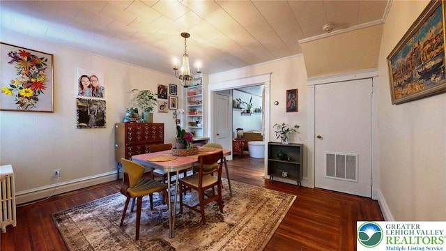 1446 Chew St, Allentown City, PA 18104 - dining space featuring a chandelier, wood finished floors, crown molding, and radiator
