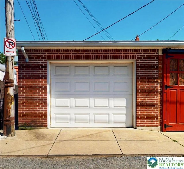 1446 Chew St, Allentown City, PA 18104 - garage featuring driveway