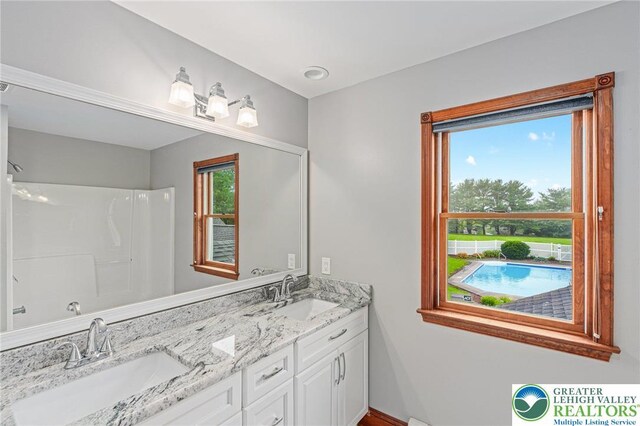 1151 Marfield Dr, Bushkill Twp, PA 18064 - full bath with double vanity and a shower