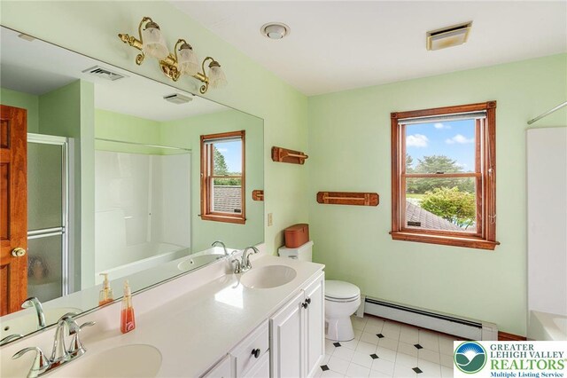 1151 Marfield Dr, Bushkill Twp, PA 18064 - full bath with a baseboard radiator, double vanity, and tile patterned flooring