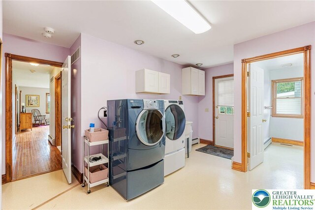 1151 Marfield Dr, Bushkill Twp, PA 18064 - washroom featuring cabinet space, washer and dryer, and a baseboard heating unit