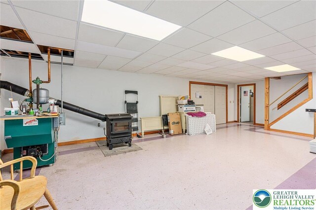 1151 Marfield Dr, Bushkill Twp, PA 18064 - below grade area with a wood stove and baseboards