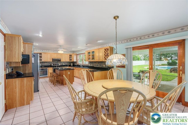 1151 Marfield Dr, Bushkill Twp, PA 18064 - dining room with light tile patterned floors, plenty of natural light, a ceiling fan, and recessed lighting