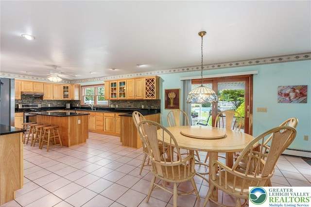 1151 Marfield Dr, Bushkill Twp, PA 18064 - dining room with light tile patterned floors and ceiling fan