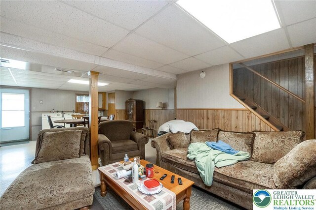 468 E 9th St, Northampton Boro, PA 18067 - living room with a drop ceiling, a wainscoted wall, stairs, and wood walls