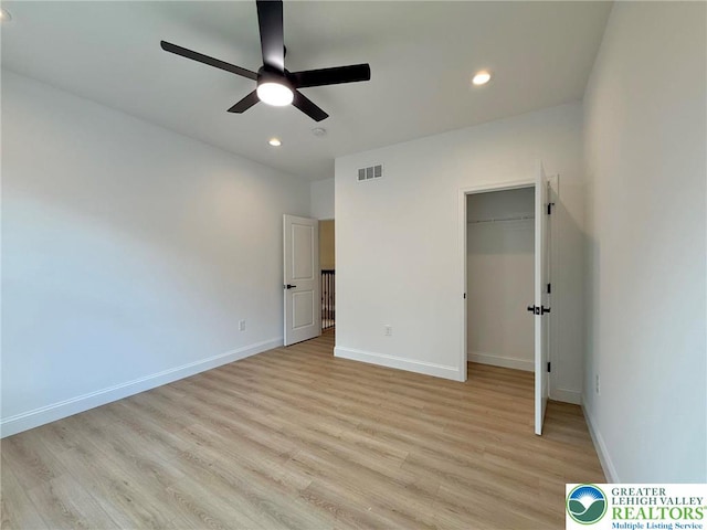 3631 Oak Ridge Dr, Washington Twp, PA 18080 - unfurnished bedroom featuring light wood finished floors, recessed lighting, a walk in closet, ceiling fan, and a closet