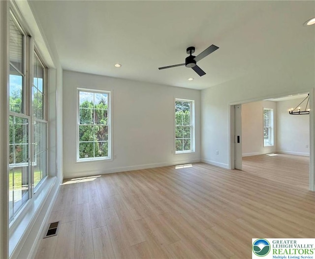 3631 Oak Ridge Dr, Washington Twp, PA 18080 - spare room with healthy amount of natural light, light wood finished floors, a chandelier, ceiling fan, and recessed lighting
