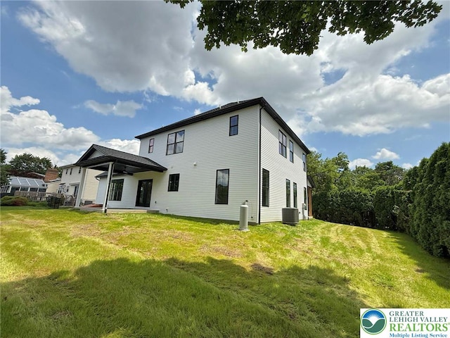 3631 Oak Ridge Dr, Washington Twp, PA 18080 - back of house featuring a lawn