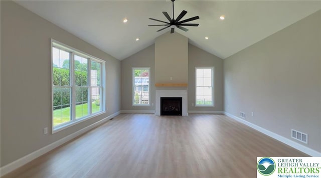 3631 Oak Ridge Dr, Washington Twp, PA 18080 - unfurnished living room featuring plenty of natural light, high vaulted ceiling, light wood-type flooring, and recessed lighting