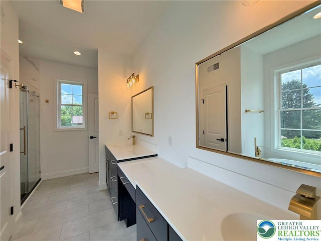 3631 Oak Ridge Dr, Washington Twp, PA 18080 - full bathroom featuring double vanity, a stall shower, recessed lighting, and tile patterned flooring
