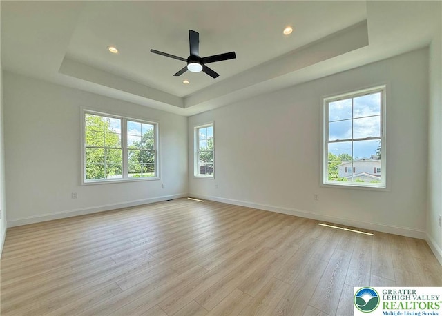 3631 Oak Ridge Dr, Washington Twp, PA 18080 - spare room with a raised ceiling, light wood-type flooring, a ceiling fan, and recessed lighting