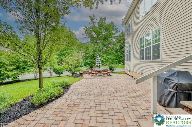 780 Ramblewood Dr, Forks Twp, PA 18040 - view of patio with area for grilling and outdoor dining area