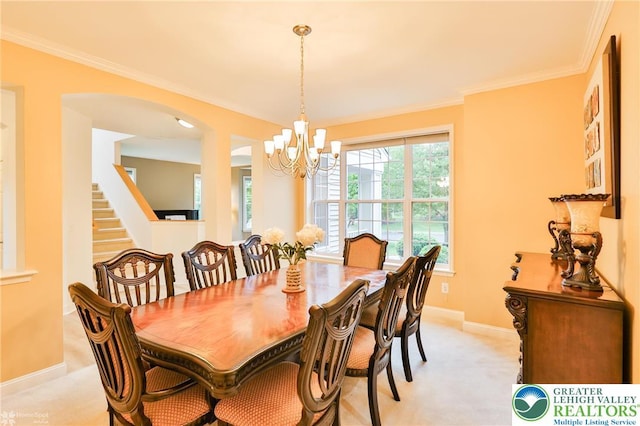 780 Ramblewood Dr, Forks Twp, PA 18040 - dining room with a chandelier, crown molding, light colored carpet, arched walkways, and stairs