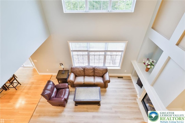 780 Ramblewood Dr, Forks Twp, PA 18040 - living area with wood finished floors and a towering ceiling