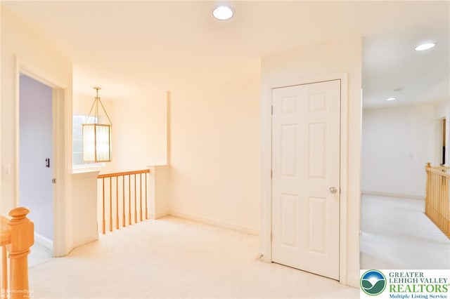 780 Ramblewood Dr, Forks Twp, PA 18040 - hallway featuring carpet floors, recessed lighting, and an upstairs landing