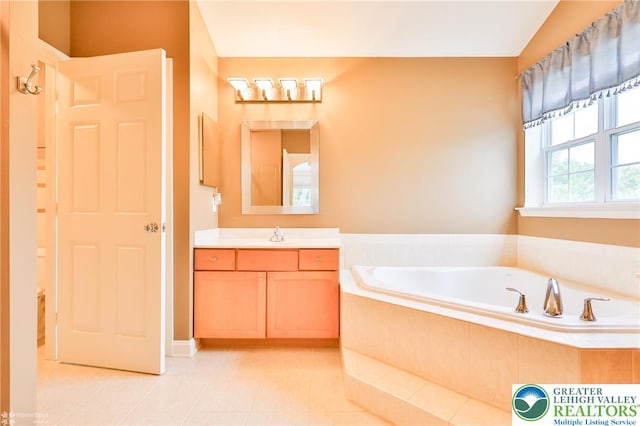 780 Ramblewood Dr, Forks Twp, PA 18040 - bathroom featuring vanity, a bath, and tile patterned flooring