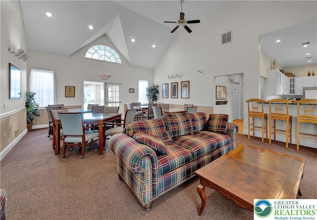 4693 Bluegrass Ln, Lower Macungie Twp, PA 18062 - living room featuring high vaulted ceiling, light colored carpet, healthy amount of natural light, recessed lighting, and a ceiling fan