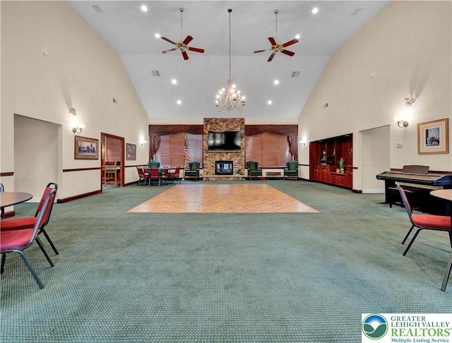 4693 Bluegrass Ln, Lower Macungie Twp, PA 18062 - living area with high vaulted ceiling, carpet flooring, a ceiling fan, a chandelier, and recessed lighting