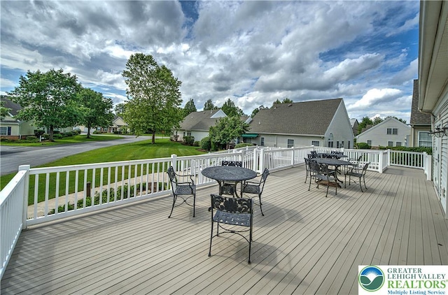 4693 Bluegrass Ln, Lower Macungie Twp, PA 18062 - deck featuring outdoor dining area, a residential view, and a lawn