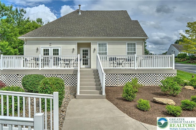 4693 Bluegrass Ln, Lower Macungie Twp, PA 18062 - rear view of property with a shingled roof, a wooden deck, and stairs
