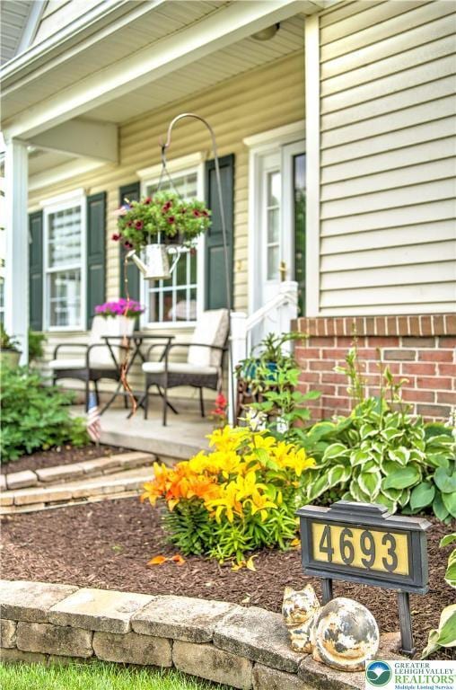 4693 Bluegrass Ln, Lower Macungie Twp, PA 18062 - property entrance featuring a porch