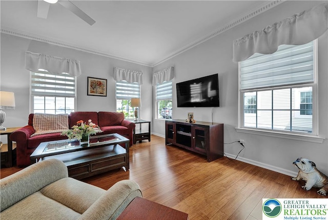 4693 Bluegrass Ln, Lower Macungie Twp, PA 18062 - living room featuring wood finished floors, crown molding, and a ceiling fan