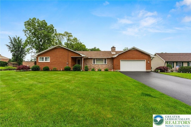 194 Gallagher Rd, Whitehall Twp, PA 18052 - single story home featuring brick siding, driveway, a garage, a chimney, and a front yard