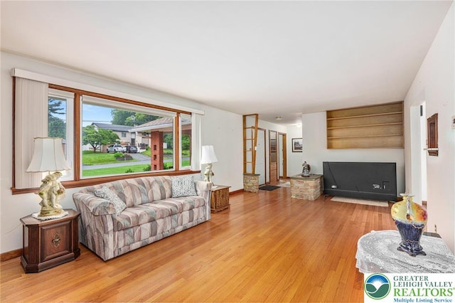 194 Gallagher Rd, Whitehall Twp, PA 18052 - living room with light wood finished floors and baseboards