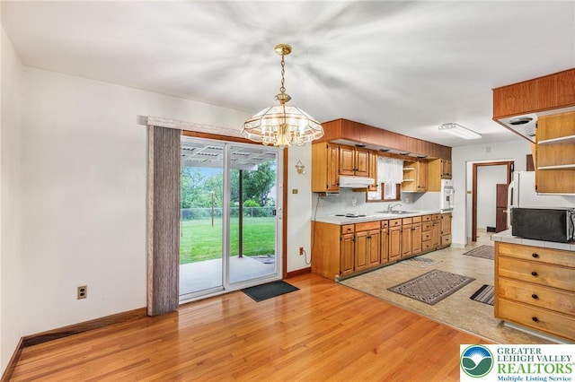 194 Gallagher Rd, Whitehall Twp, PA 18052 - kitchen with open shelves, light countertops, and white appliances