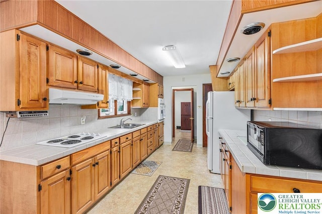 194 Gallagher Rd, Whitehall Twp, PA 18052 - kitchen featuring open shelves, white electric stovetop, under cabinet range hood, black microwave, and tile countertops