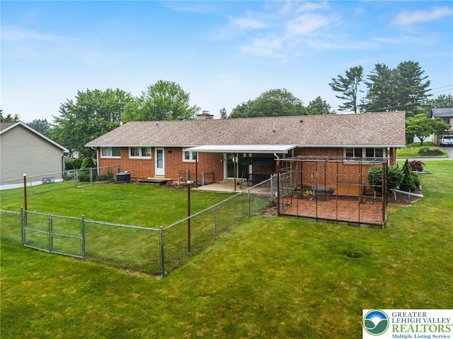 194 Gallagher Rd, Whitehall Twp, PA 18052 - back of house with a gate, a fenced backyard, brick siding, and a chimney