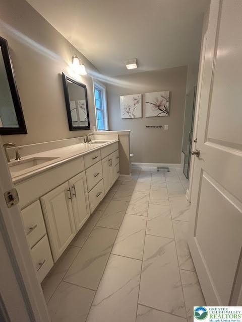 1051 Resolution Dr, Hanover Twp, PA 18017 - bathroom with marble look tile flooring and double vanity