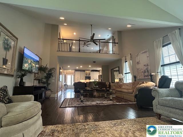 1051 Resolution Dr, Hanover Twp, PA 18017 - living area featuring high vaulted ceiling, a ceiling fan, hardwood / wood-style floors, and recessed lighting