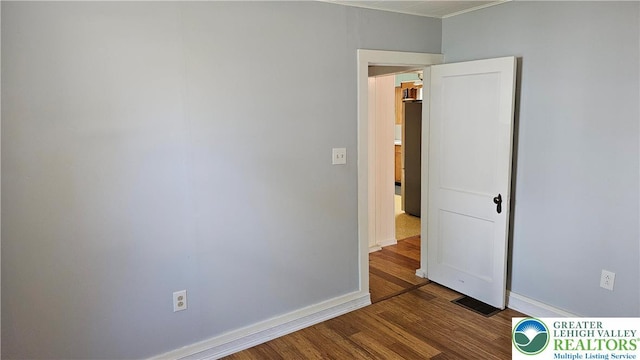 532 Oakwood St, Palmer Twp, PA 18045 - empty room featuring wood finished floors and ornamental molding