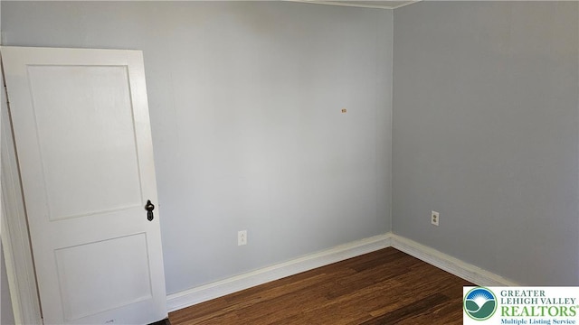 532 Oakwood St, Palmer Twp, PA 18045 - empty room with dark wood-style floors and baseboards