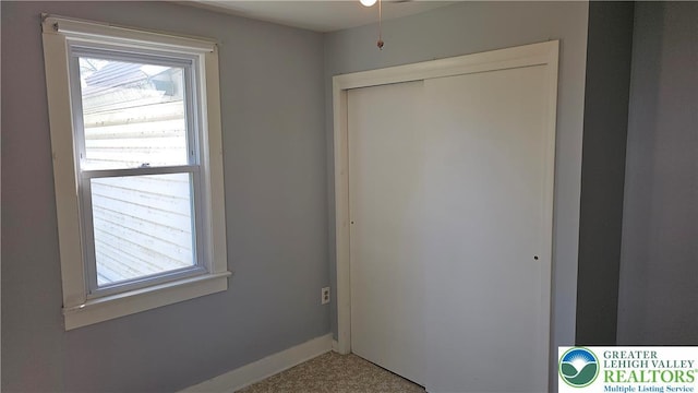 532 Oakwood St, Palmer Twp, PA 18045 - unfurnished bedroom with multiple windows and a closet