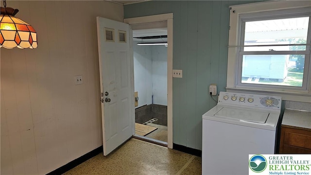 532 Oakwood St, Palmer Twp, PA 18045 - laundry area with washer / clothes dryer and wood walls