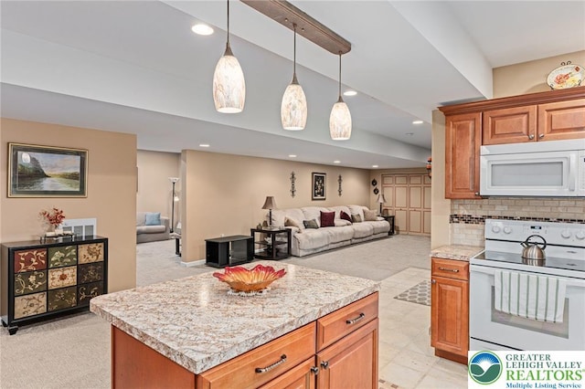 6841 Stone Croft Cir, Macungie Boro, PA 18062 - kitchen featuring white appliances, light colored carpet, open floor plan, recessed lighting, and tasteful backsplash