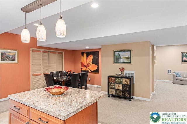 6841 Stone Croft Cir, Macungie Boro, PA 18062 - kitchen with light carpet, open floor plan, light countertops, recessed lighting, and decorative light fixtures