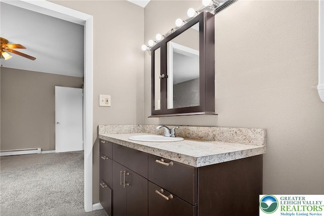 2228 Skyline, Washington Twp, PA 18080 - bathroom with baseboard heating, vanity, and ceiling fan