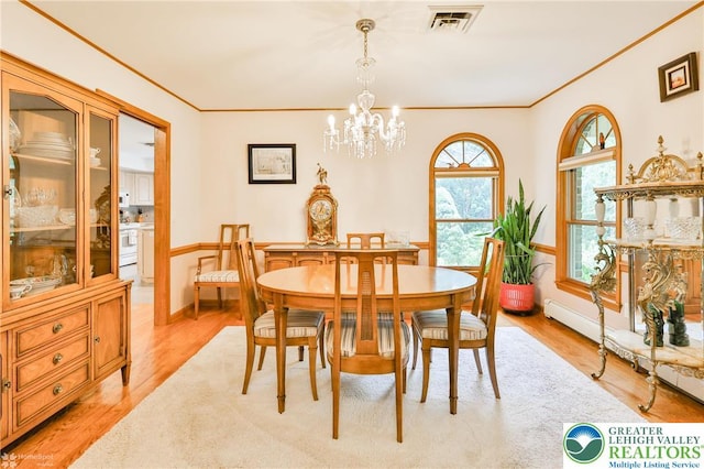 3745 Orefield Rd, South Whitehall Twp, PA 18104 - dining room featuring a chandelier, ornamental molding, and light wood finished floors