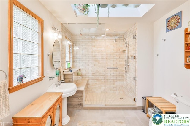 3745 Orefield Rd, South Whitehall Twp, PA 18104 - full bath with a skylight, a stall shower, tile patterned flooring, and plenty of natural light